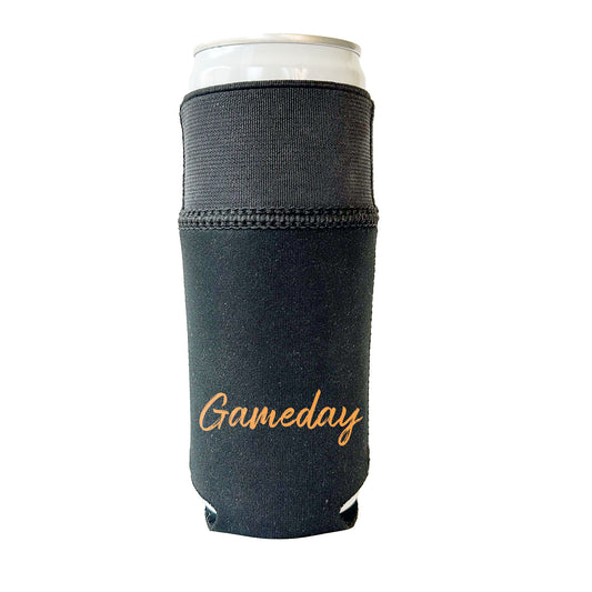 Front view of an all Black Candabra Hero, Black Neoprene Sleeve with Black elastic.  Shown on a slim 12 oz can. Embellished with the word GAMEDAY in bright orange distressed script letters.